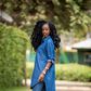 Diana Machira takes on a bold look with an oversized denim shirt over denim pant