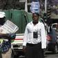 Hawkers sell newspapers and bottled water on the streets of Zimbabwe's capital Harare, September 17, 2015. REUTERS/Philimon Bulawayo