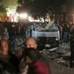 Damaged cars are seen at the scene of a bomb blast in Giza, Egypt, January 21, 2016. A bomb attack killed six people, including three policemen, on Thursday near a road leading to the pyramids in the Cairo suburb of Giza, security sources said. REUTERS...