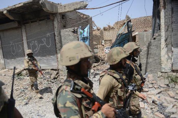 Pakistan says militants firing from Afghanistan kill seven soldiers