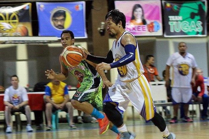Manny Pacquiao playing basket ball in Nike shoes