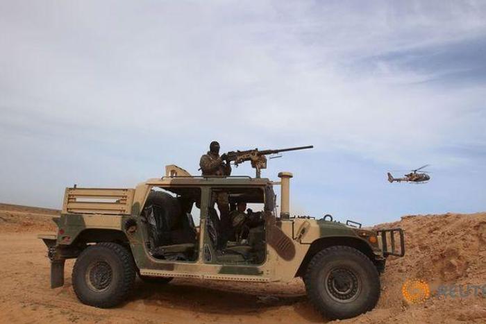 Tunisia security forces, militants clash in border town, 3 killed