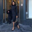 Millen Magese in an all black ensemble