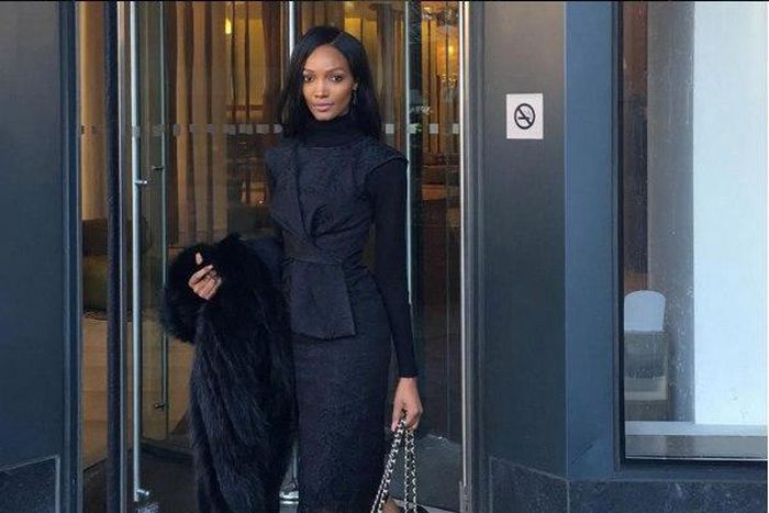 Millen Magese in an all black ensemble