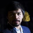 Filipino boxing superstar Manny Pacquiao watches the exhibition of Philippine Gold "Treasures of Forgotten Kingdoms" in New York, October 12, 2015.