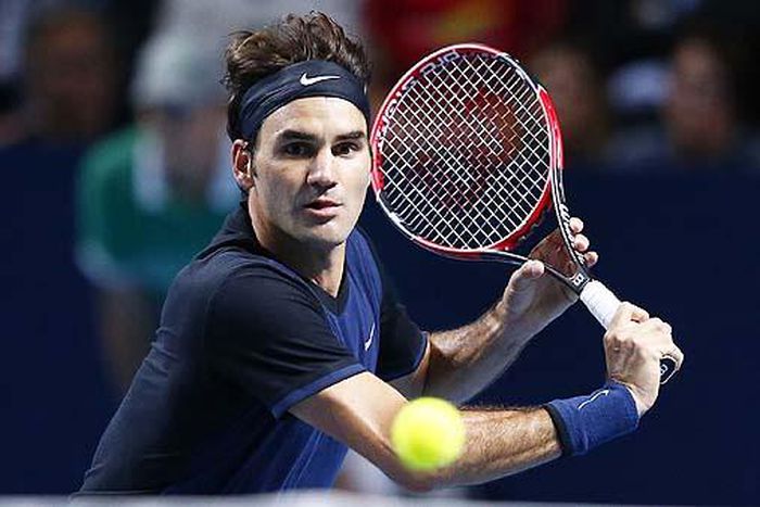 Federer downed by Isner, Nadal lucky to survive