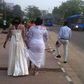 A stranded bride trekking on the expressway as Lagos City Marathon held on Saturday, February 6, 2016
