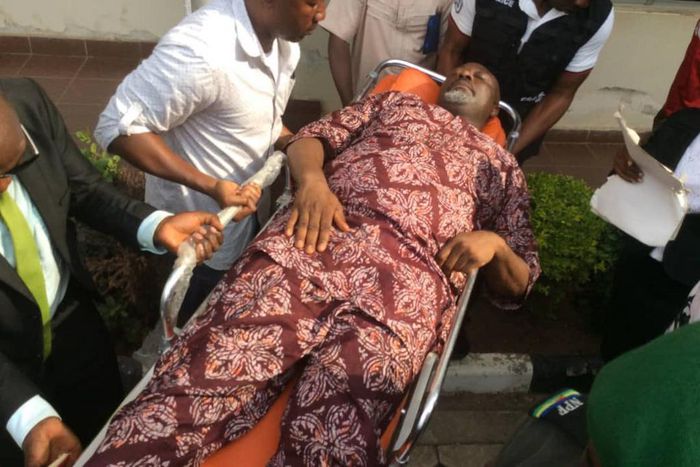 Senator Dino Melaye wheeled into an Abuja Magistrate Court on a stretcher