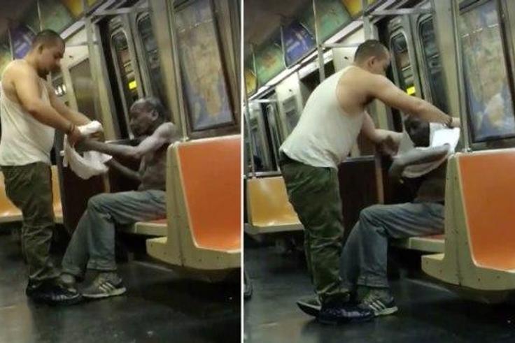 Man clothes shivering old black man on New York Subway