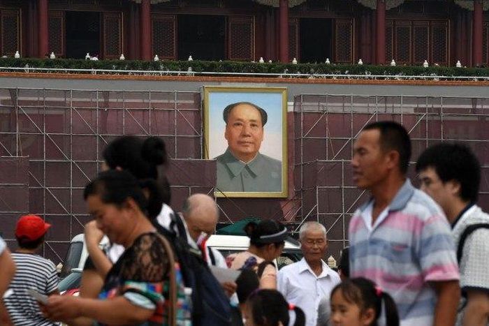 China punishes five officials for influencing courts