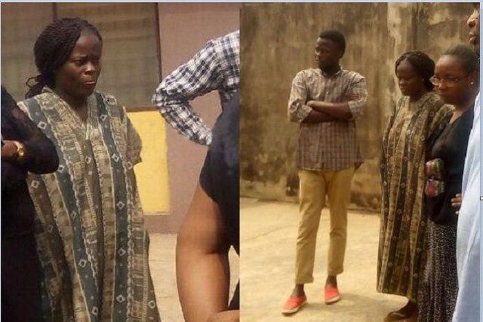 Yewande Oyediran (in Kaftan and braids), with family members
