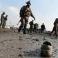 Suicide bomber in Afghan city kills 3, wounds 14