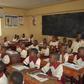 Ekiti State ex-governor's wife, Erelu Bisi Fayemi, teaching Primary 4 pupils of the SUBEB Model Nursery and Primary School, Efon-Alaye.