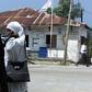 Two muslim women walk past offices of the Civic United Front on Tanzania's Pemba in a file photo.