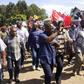 Democratic Republic of Congo's President Joseph Kabila (front C) waves as he walks in a file photo. REUTERS/Kenny Katombe