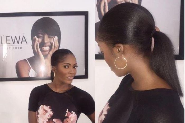 Tiwa Savage flaunting her hair.