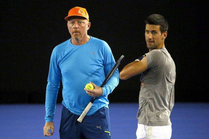 Serbia's Novak Djokovic (R) walks past his coach Boris Becker during a practice session at Melbourne Park, Australia, January 14, 2016. The Australian Open tennis tournament starts January 18. REUTERS/David Gray