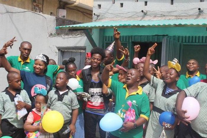 Korede Bello celebrates with Down Syndrome kids