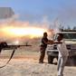 A freelance journalist travelling with the Misarata brigade shows fighters from the Islamist Misarata brigade firing towards Tripoli airport.