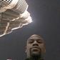 Floyd Mayweather in front of the Burj Khalifa Hotel in Dubai as he holidays in Dubai