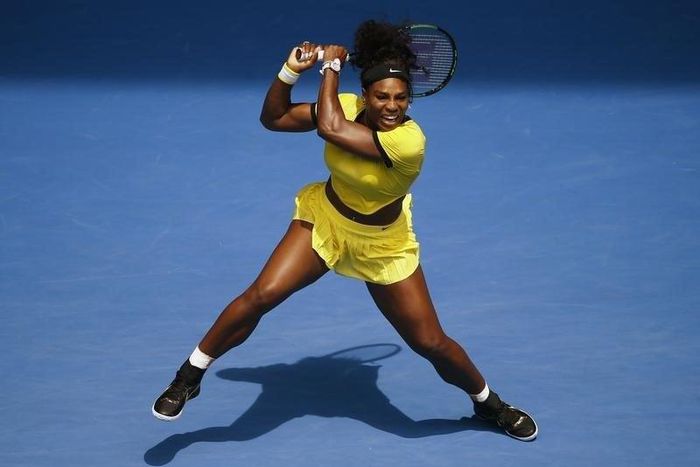 Serena Williams of the U.S. hits a shot during her quarter-final match against Russia's Maria Sharapova at the Australian Open tennis tournament at Melbourne Park, Australia, January 26, 2016. REUTERS/Jason Reed