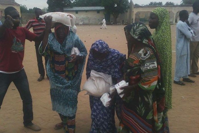 Elderly women reviewing relief materials in Internally displaced persons (IDPs) camps in Magumeri Borno State. Photos: Ibrahim Yerwabe