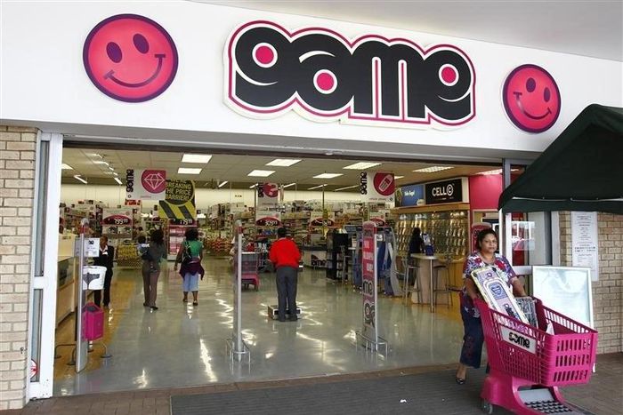A shopper leaves the Game store in South Gate mall south of Johannesburg September 27, 2010. REUTERS/Siphiwe Sibeko