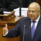 South Africa's Finance Minister Pravin Gordhan delivers his 2014 budget address in Parliament in Cape Town February 26, 2014. REUTERS/Mike Hutchings