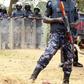 Riot police block a driveway leading to the home of leading opposition politician , Uganda. February 20, 2016. REUTERS/James Akena