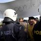 Greek police start removing migrants from Macedonian border
