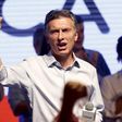 Opposition candidate Macri takes early lead in Argentina election