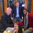 Emmanuel Adebayor with Crystal Palace chiarman Steve Parish and coach Alan Pardew