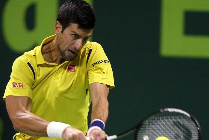 Novak Djokovic of Serbia returns the ball to Rafael Nadal of Spain during their Qatar Open men's single tennis final match in Doha, Qatar, January 9, 2016. REUTERS/Ibraheem Al Omari