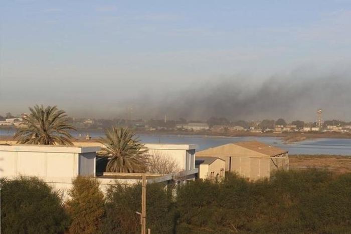 Smoke rises after an airstrike hit Maitiga airport early Thursday morning, in Tripoli March 5, 2015. REUTERS/Hani Amara