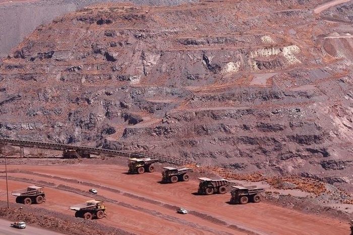 Haul trucks are seen at Kumba Iron Ore, the world's largest iron ore mines in Khathu, Northern Cape Province in a file photo. REUTERS/Siphiwe Sibeko