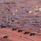 Haul trucks are seen at Kumba Iron Ore, the world's largest iron ore mines in Khathu, Northern Cape Province in a file photo. REUTERS/Siphiwe Sibeko