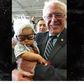 Bernie Sanders holding Oliver Jack Carter Lomas-Davis