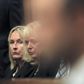 June Steenkamp (L), the mother of Reeva Steenkamp, glances at Oscar Pistorius as he sits in the dock ahead of the trial of the Olympic and Paralympic track star at the North Gauteng High Court in Pretoria March 3, 2014. REUTERS/Themba Hadebe/Pool
