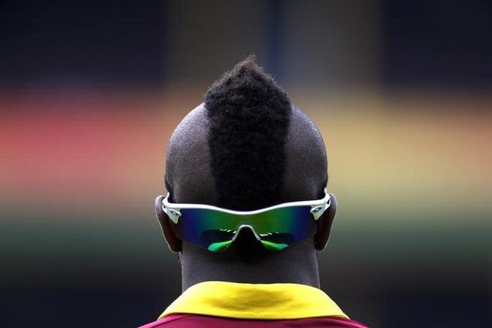 Andre Russell of the West Indies fields in the outfield during the warm-up match against England at the Sydney Cricket Ground February 9, 2015. REUTERS/David Gray/Files