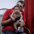 Glecion Fernando holds his 2 month old son Guilherme Soares Amorim, who was born with microcephaly, near at her house in Ipojuca, Brazil, February 1, 2016.   REUTERS/Ueslei Marcelino