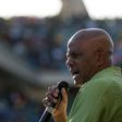 The Association of Mineworkers and Construction Union (AMCU) President Joseph Mathunjwa speaks to striking mine workers at the Royal Bafokeng Stadium in Rustenburg, June 23, 2014. REUTERS/Skyler Reid