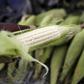 A hawker prepares a cob of corn at his makeshift shop in Soweto, January 27, 2016. REUTERS/Siphiwe Sibeko