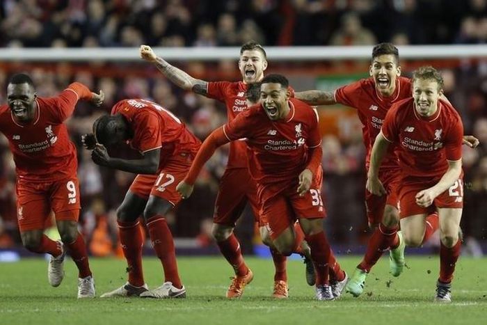 Liverpool celebrate after Joe Allen (not pictured) scores the penalty to win the penalty shootout Action Images via Reuters / Carl Recine Livepic