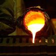 Refined gold is poured into moulds to be made into gold bars at South Africa's Rand Refinery in Germiston in a file photo. REUTERS/Siphiwe Sibeko