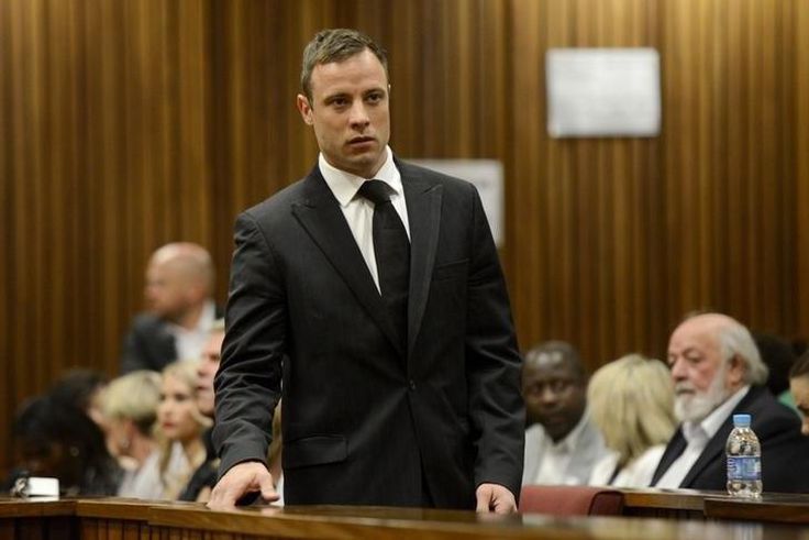 South African Olympic and Paralympic track star Oscar Pistorius attends his sentencing at the North Gauteng High Court in Pretoria October 21, 2014. REUTERS/Herman Verwey/Pool