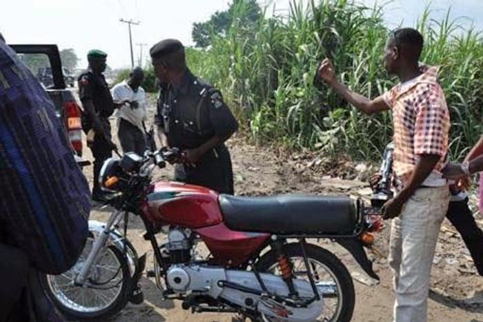 2 docked for allegedly attacking policeman with bottles