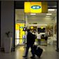 Travellers walk past an MTN telecom shop at King Shaka International Airport in Durban, South Africa, November 16, 2015.   REUTERS/Rogan Ward