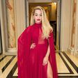 Rita Ora chose a red caped dress with thigh high slit for the Ralph & Russo's Chopard event