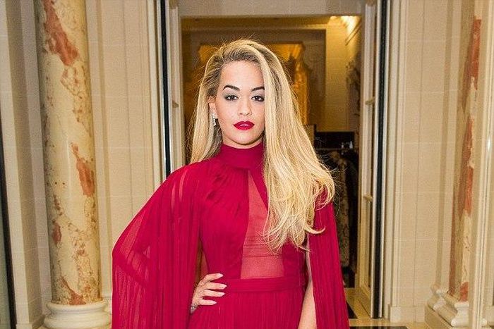 Rita Ora chose a red caped dress with thigh high slit for the Ralph & Russo's Chopard event