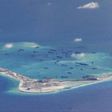 China defends South China Sea reef landings after Vietnam complaint